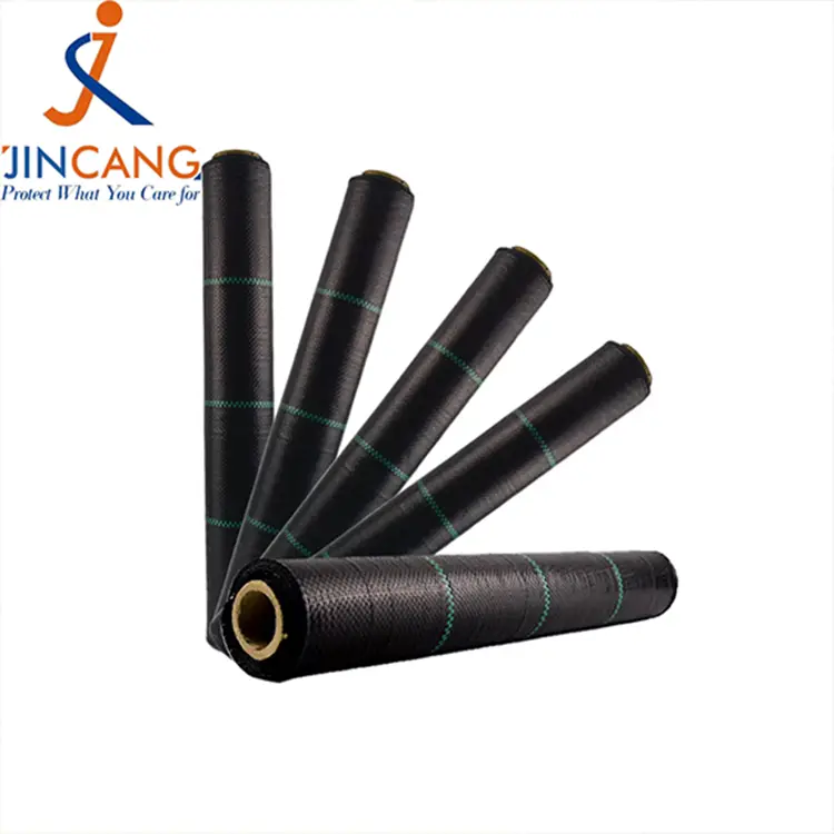 Арамшөпке қарсы матаға арналған матамен қапталған бақша арамшөптері Арамшөпке қарсы матаға арналған матамен қапталған бақша арамшөптері